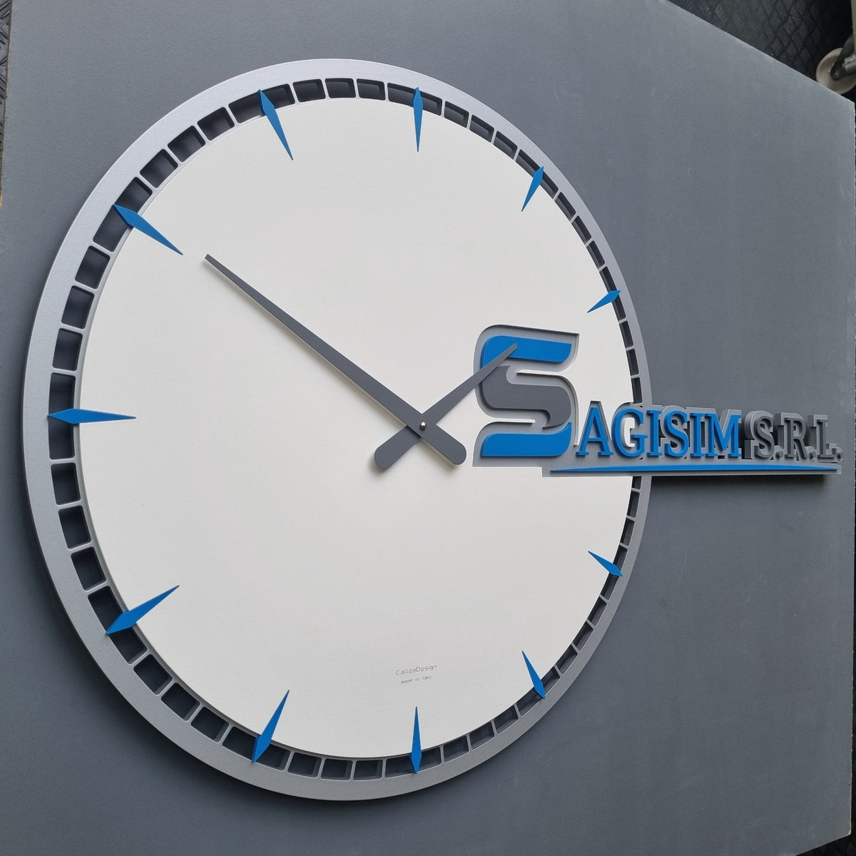 Bespoke CalleaDesign wall clock customised for SAGISIM