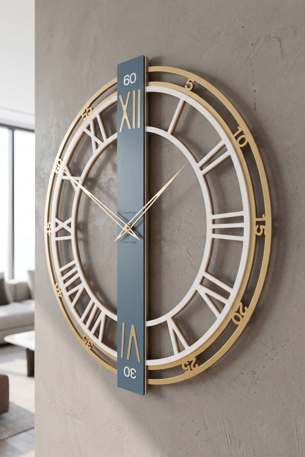 CalleaDesign Franz wall clock in Dark Teal, gold and white finish on a textured concrete wall in a contemporary interior